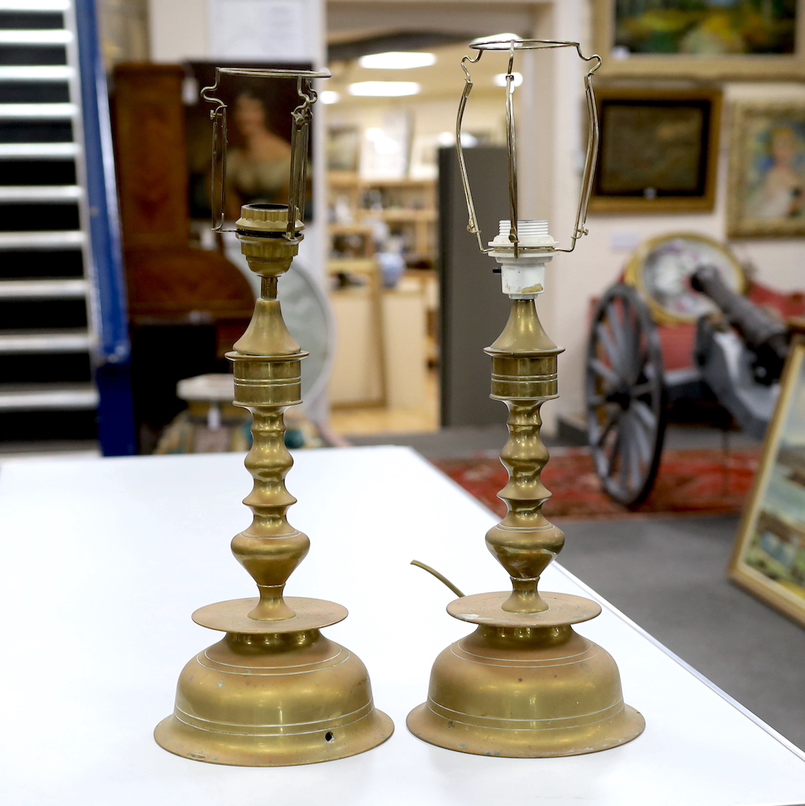 A pair of Dutch style brass table lamps, height 37cm